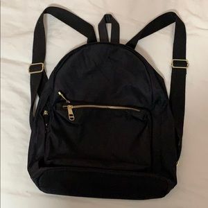 NWT!! Sleek classic black backpack